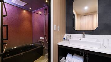 Separate tub and shower, hair dryer, bidet, towels