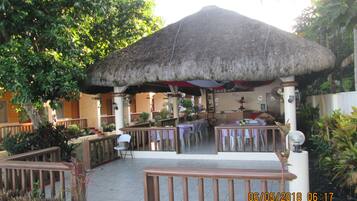 Breakfast, lunch served; local and international cuisine, pool views