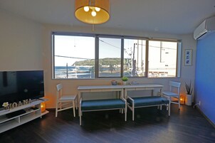 Family Condo, 1 Bedroom, Beachfront | 1 bedroom, desk, blackout drapes, free WiFi