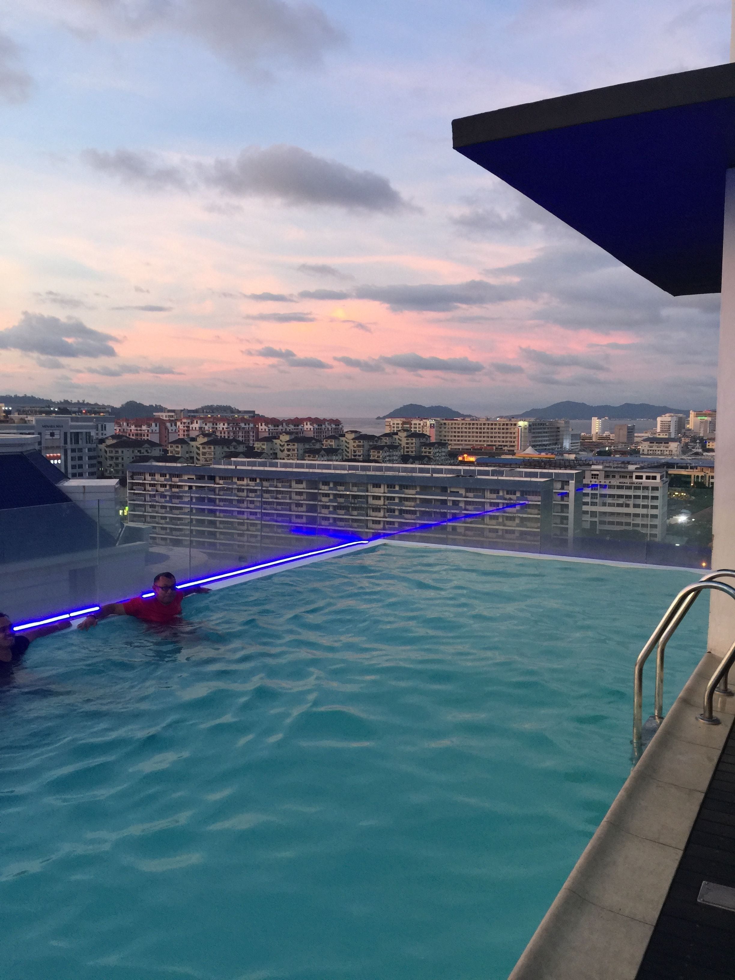 Outdoor pool, a rooftop pool, pool loungers