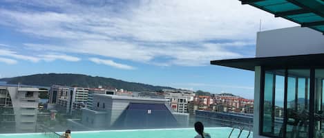 Outdoor pool, a rooftop pool, sun loungers