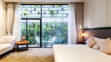 Deluxe Room, Garden View | Premium bedding, minibar, blackout drapes, free WiFi