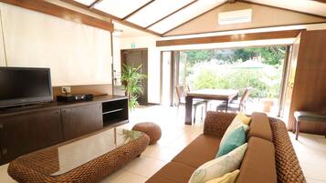 Fukugi Terrace Suite 67sqm | Living area | Flat-screen TV, DVD player