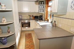 Frigorifero, forno, lavastoviglie, macchina per tè/caffè