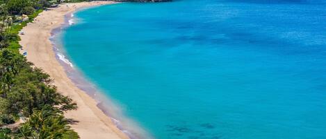 On the beach, sun-loungers, beach towels