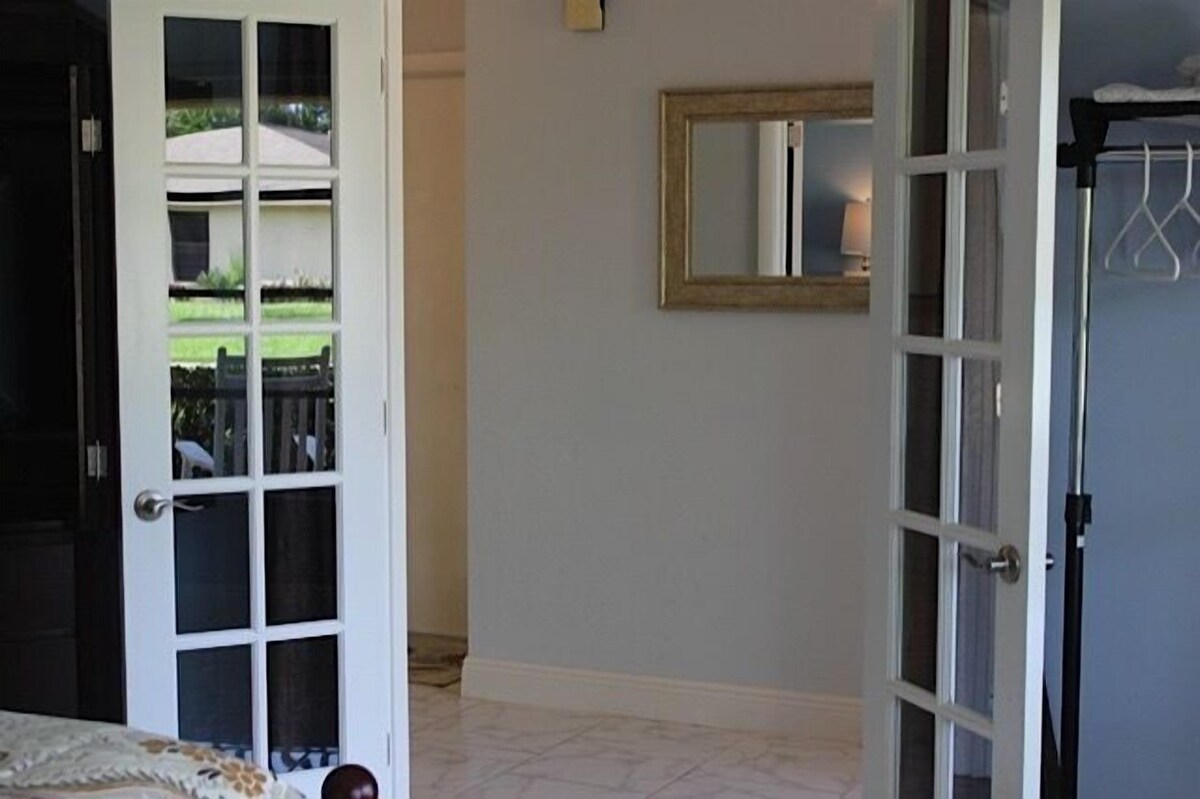 Photo 11 of Private, fenced-in pool, Morning Coffee on the porch and easy mile to the beach.