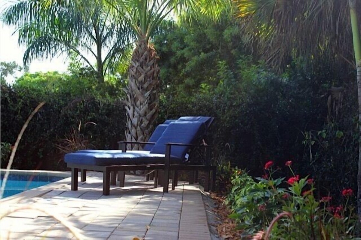 Photo 20 of Private, fenced-in pool, Morning Coffee on the porch and easy mile to the beach.