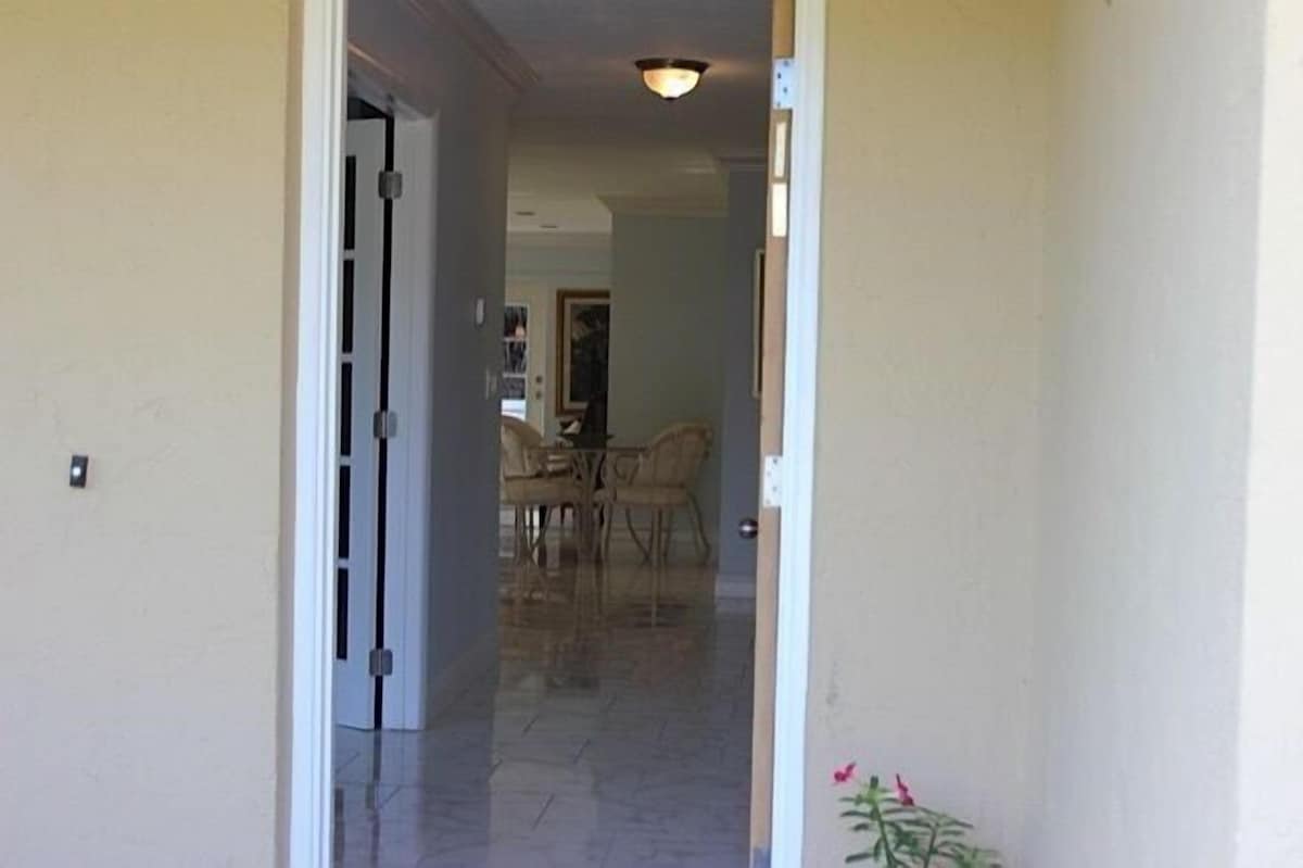 Photo 15 of Private, fenced-in pool, Morning Coffee on the porch and easy mile to the beach.