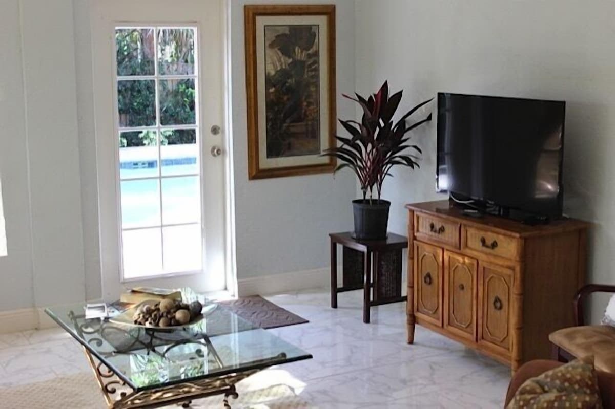 Photo 8 of Private, fenced-in pool, Morning Coffee on the porch and easy mile to the beach.