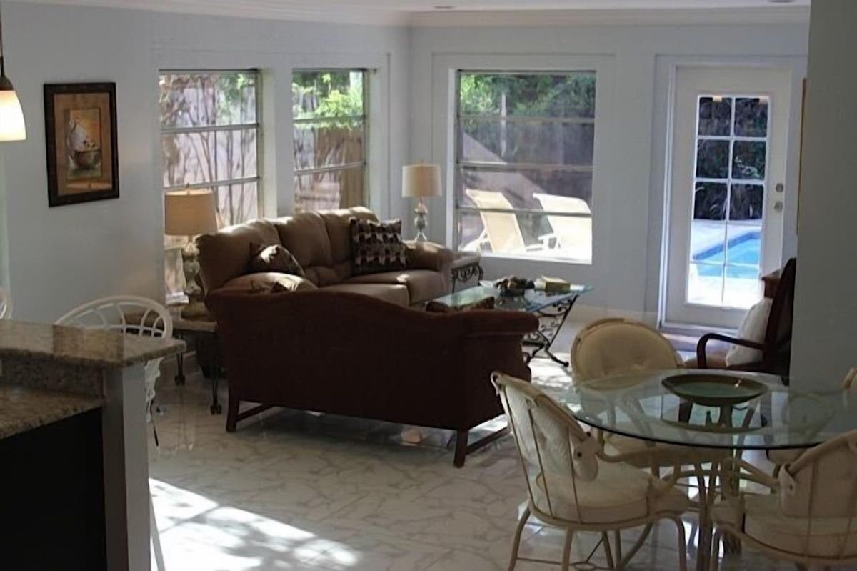 Photo 7 of Private, fenced-in pool, Morning Coffee on the porch and easy mile to the beach.