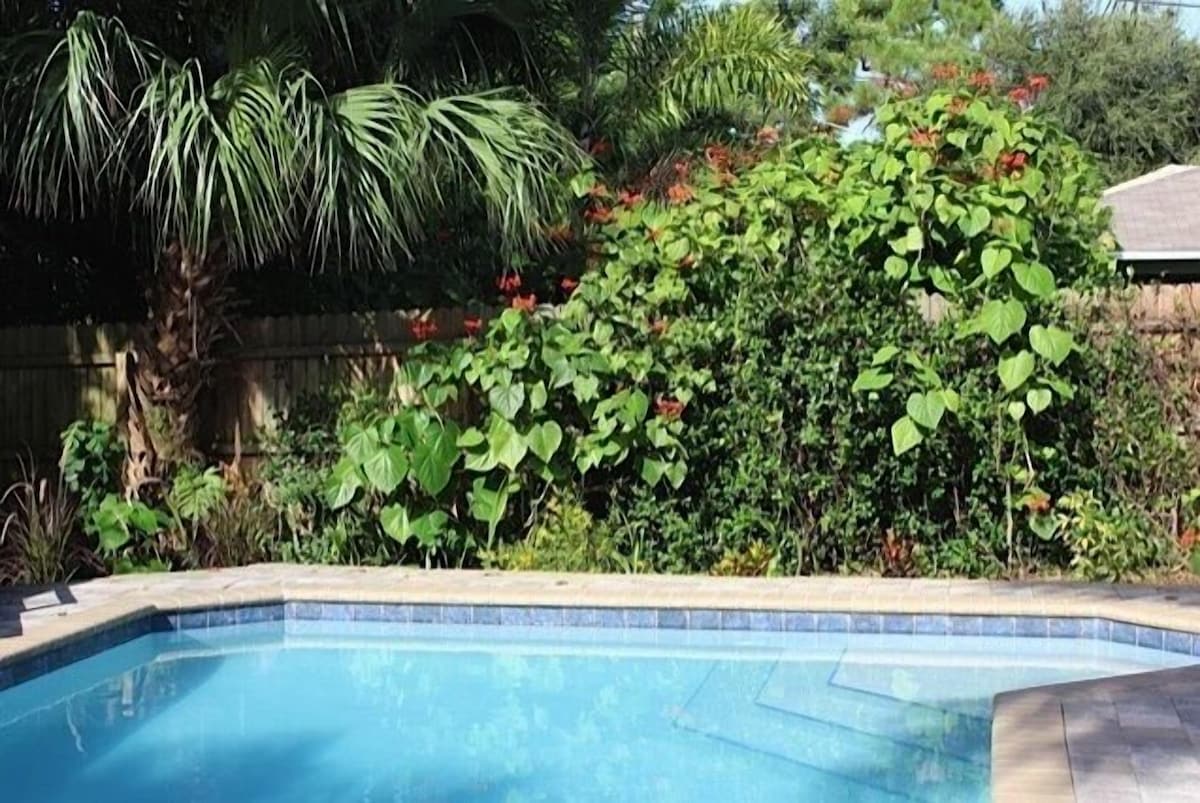 Photo 19 of Private, fenced-in pool, Morning Coffee on the porch and easy mile to the beach.
