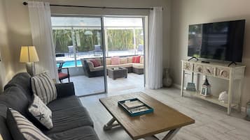 Smart TV, fireplace, books