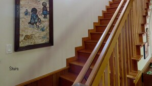 A staircase with wooden steps and a wooden handrail. - Enjoy Fresh Ocean Breezes, No Crowds In Small Community Setting (Bodega Bay)