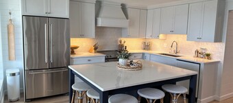 Charming newly updated 4 bedroom 2 full bath Burt Lake home
