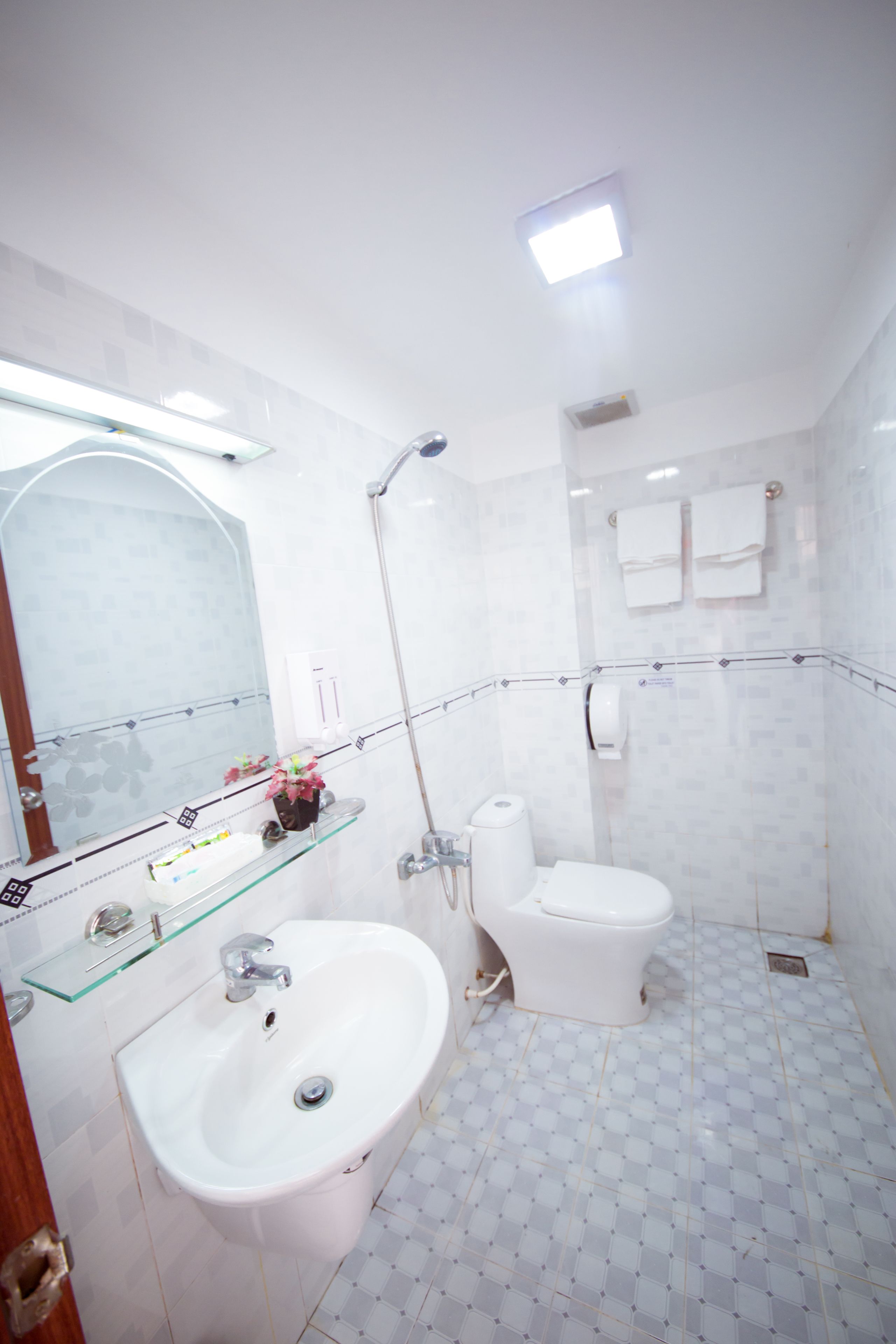 shower, free toiletries, slippers, towels