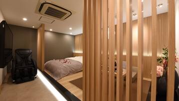 Habitación básica doble | Edredón, minibar, insonorización y tabla de planchar con plancha