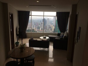 Comfort Shared Dormitory, 1 King Bed, Private Bathroom, City View | Living area | LED TV
