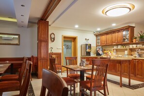 Enjoy meals in this well-appointed dining area with a large table and comfortable seating.