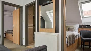 Family Room | Premium bedding, in-room safe, desk, blackout drapes