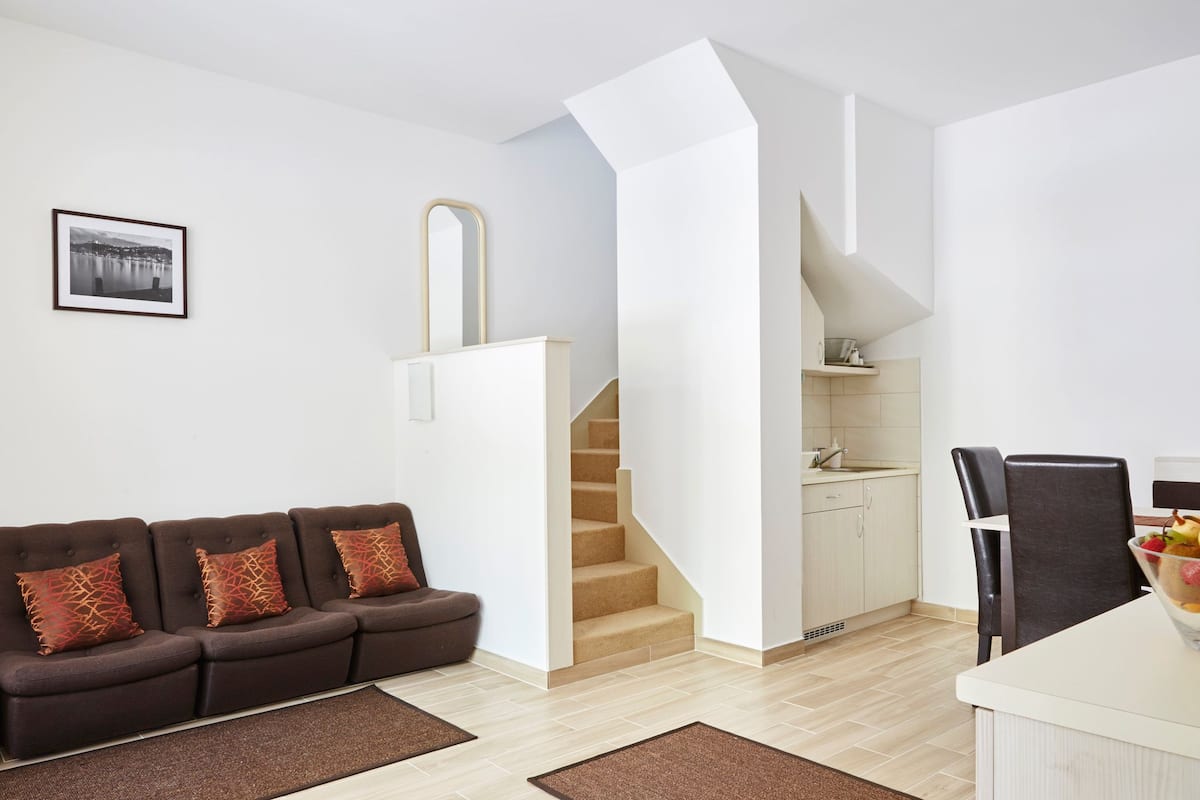 superior studio | living area | flat-screen tv