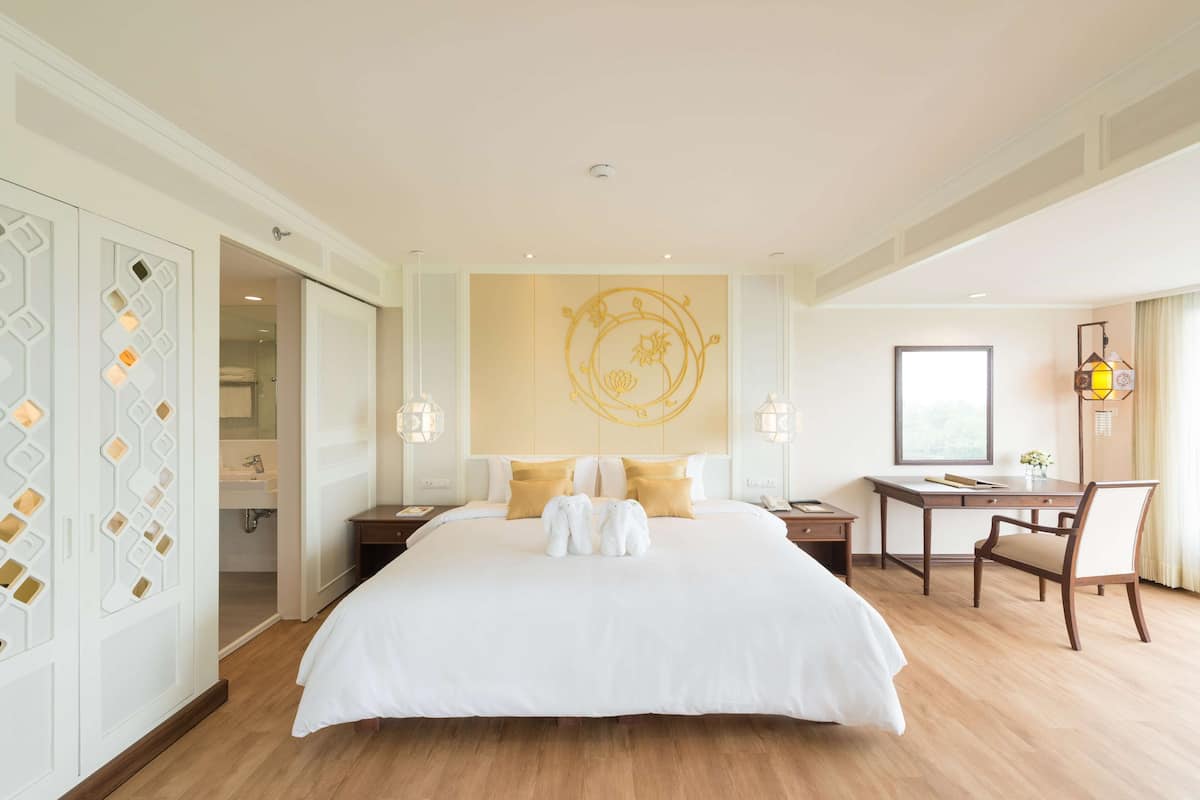 Family Suite | 1 bedroom, in-room safe, blackout drapes, iron/ironing board