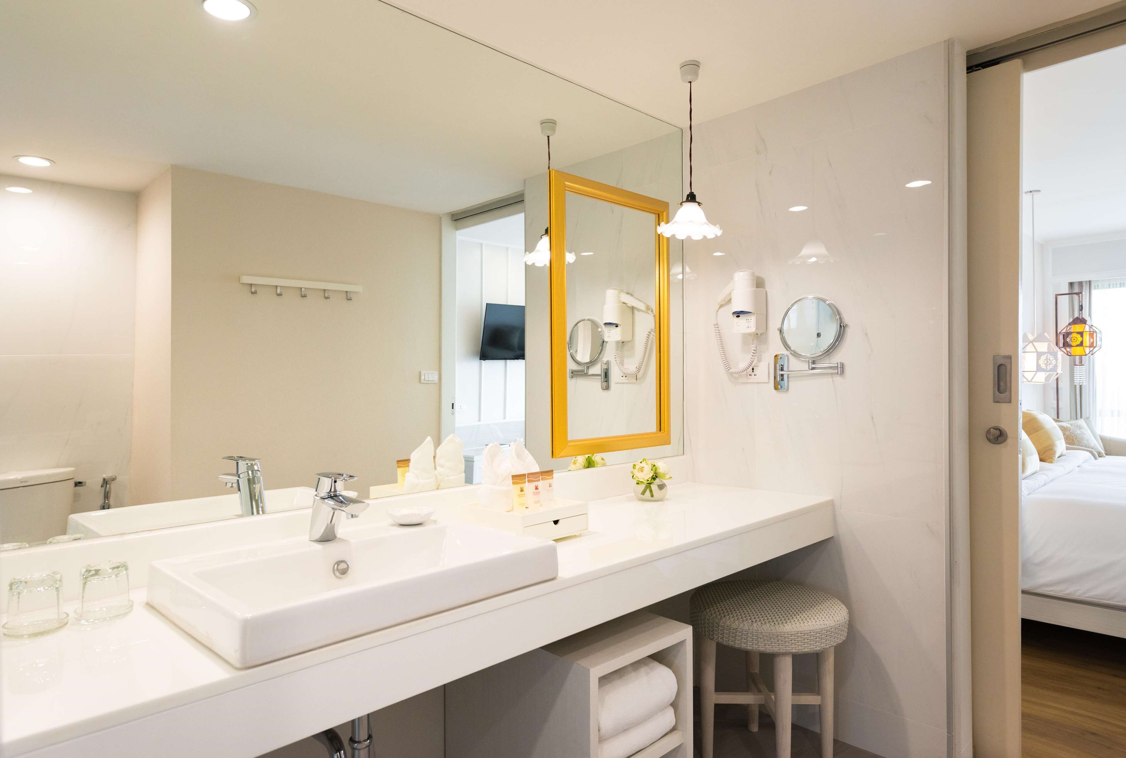 deluxe double room, river view | bathroom | shower, rainfall showerhead, designer toiletries, hair dryer