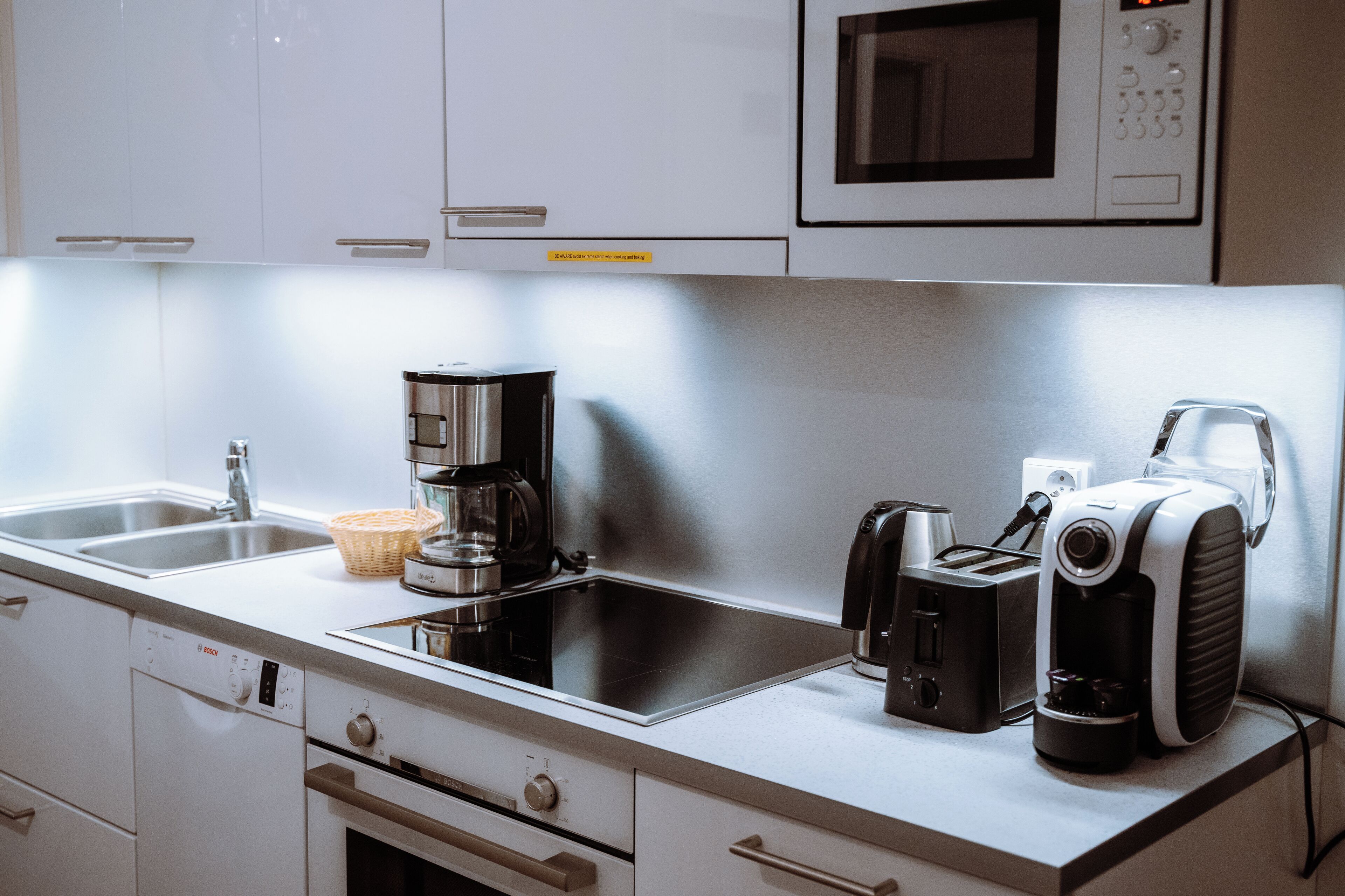 golden circle suite with kitchen & sauna | private kitchen | full-sized fridge, microwave, oven, stovetop