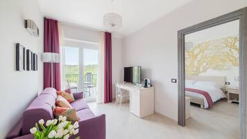 Suite | 1 bedroom, Egyptian cotton sheets, minibar, in-room safe