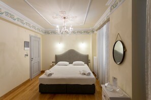 Apartamento superior | Minibar, decoración individual, mobiliario individual