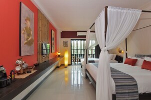 Family Room, 1 Bedroom, Non Smoking | Minibar, in-room safe, individually decorated, desk