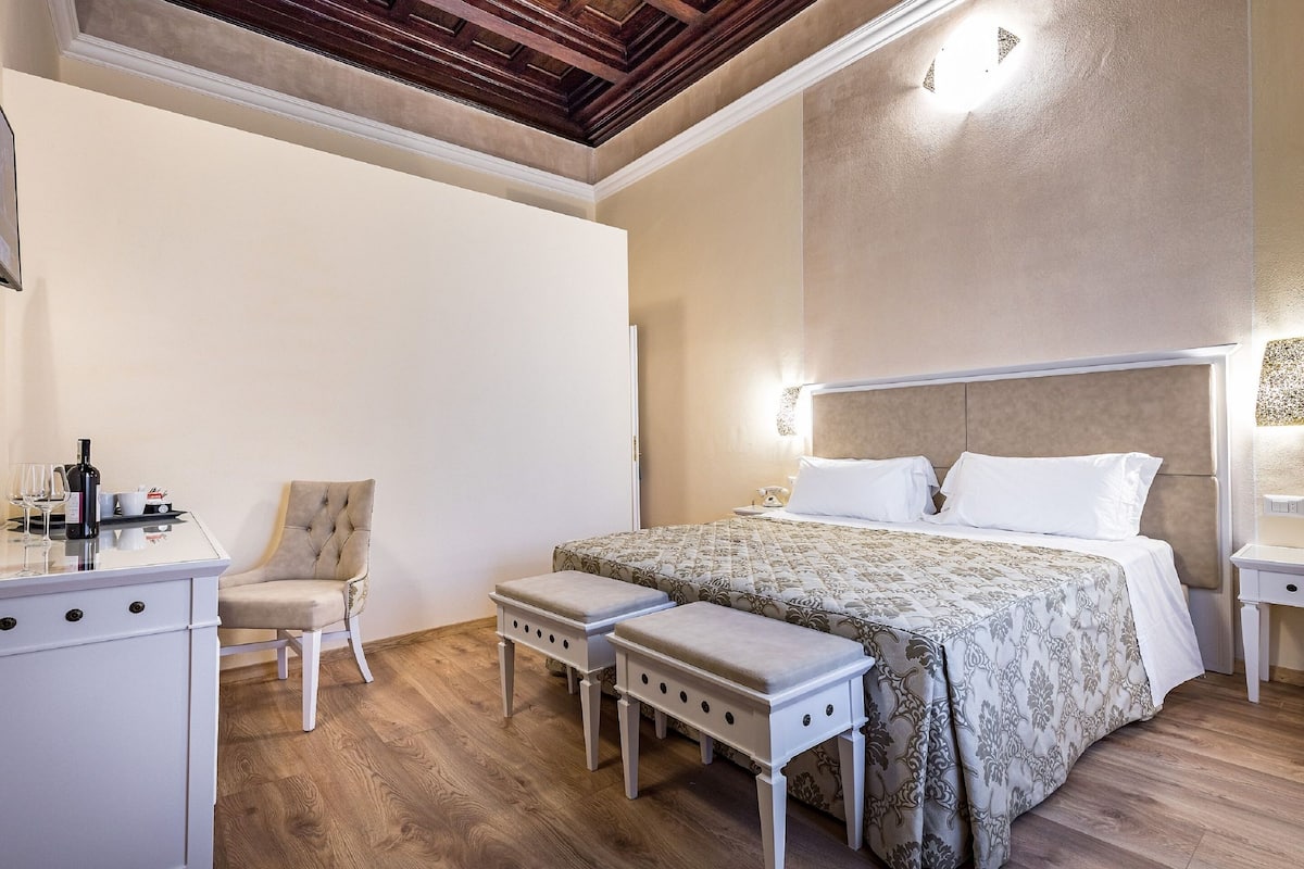 Deluxe Room (Bell Tower) | Minibar, in-room safe, desk, laptop workspace