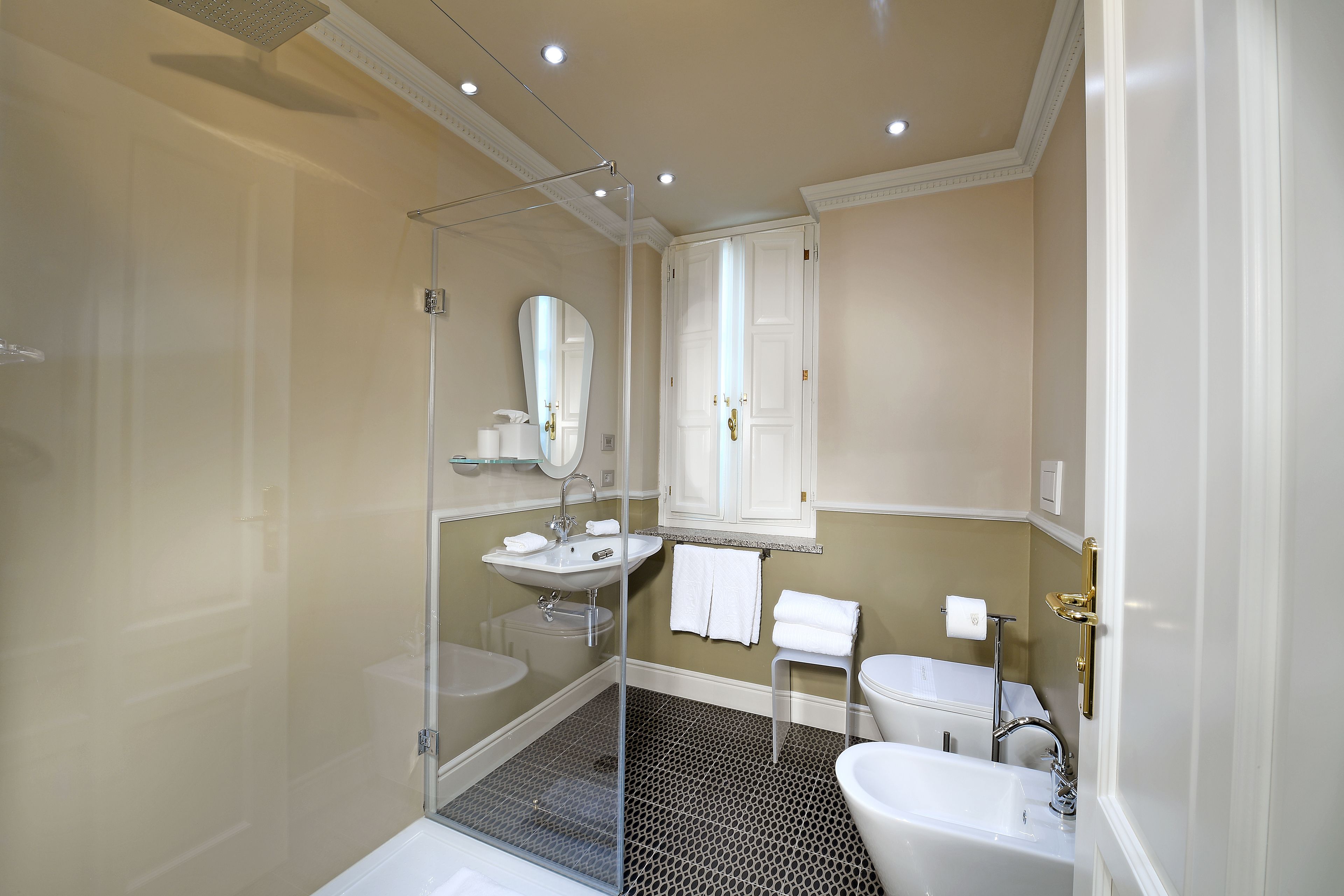 comfort room | bathroom | rainfall showerhead, free toiletries, hair dryer, bathrobes