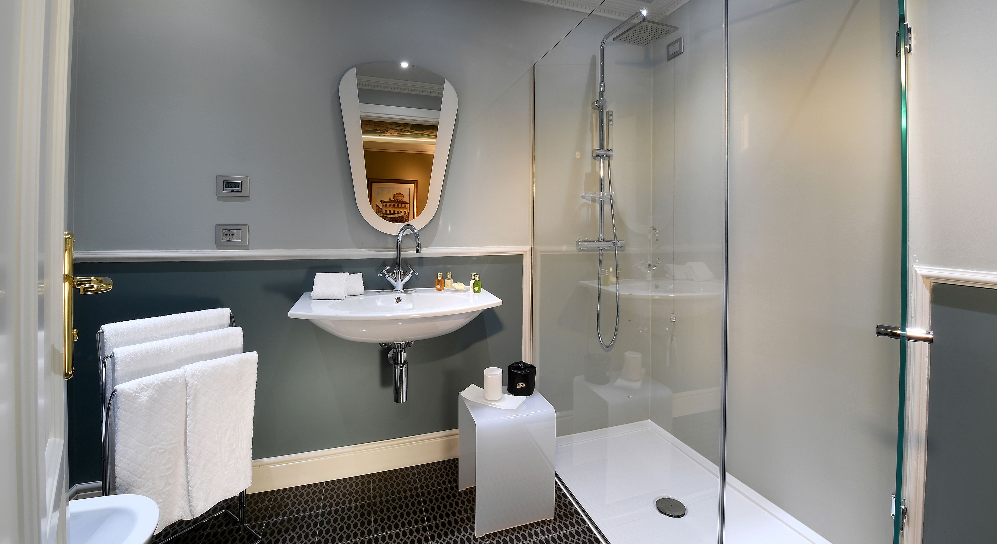 comfort room | bathroom | rainfall showerhead, free toiletries, hair dryer, bathrobes