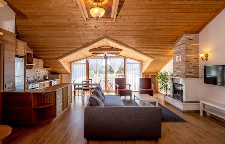 Design Apartment, 1 Bedroom | Living area | 30-inch LED TV with cable channels, TV