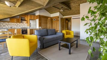 Design Apartment, 1 Bedroom | Living area | 30-inch LED TV with cable channels, TV