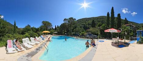 Seasonal outdoor pool, pool loungers