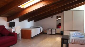 Family Room | Premium bedding, desk, blackout curtains, free WiFi