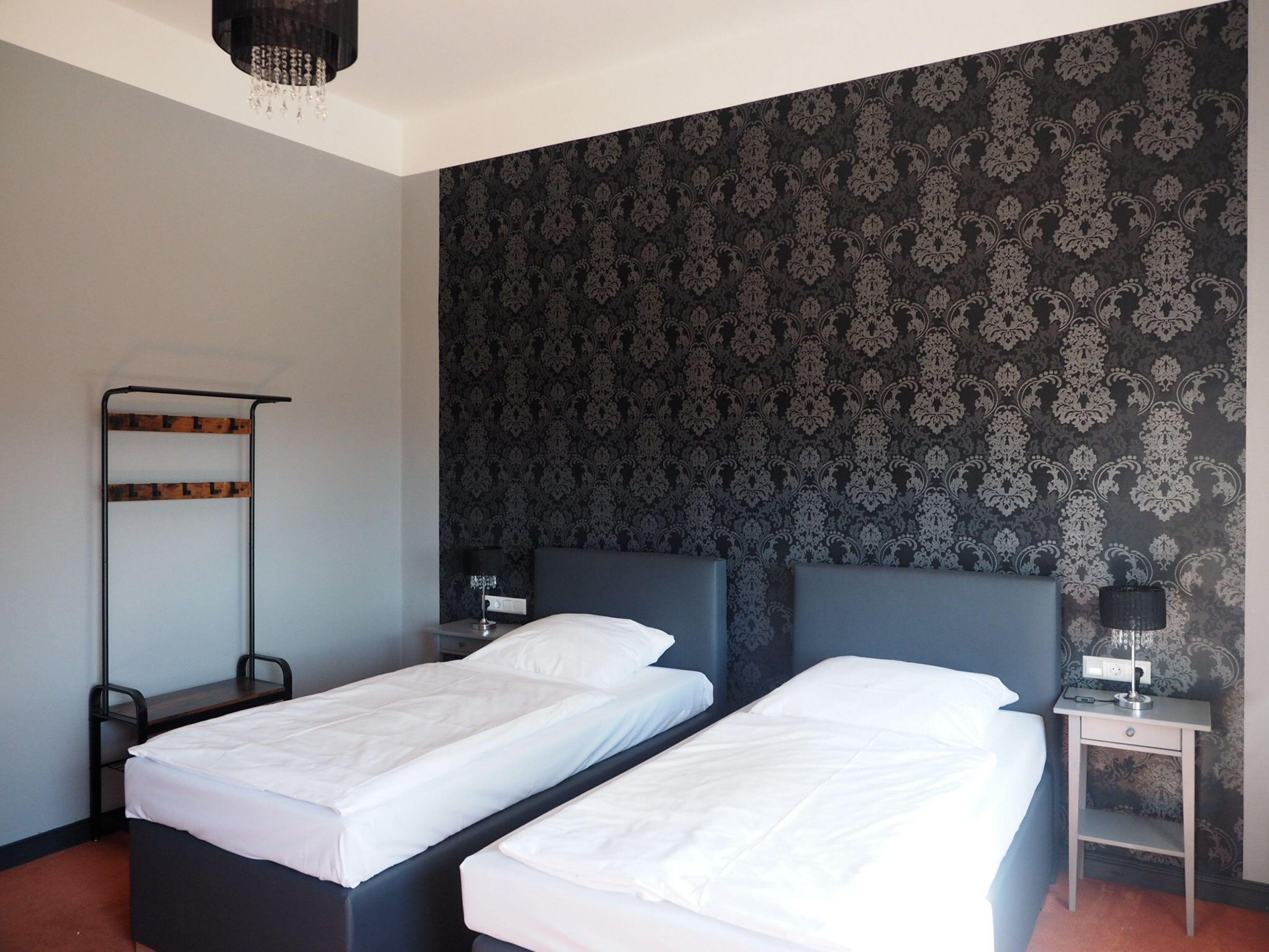 Habitación Business con 1 cama doble o 2 individuales | Wifi gratis y ropa de cama