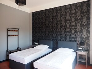 Dobbelt- eller tomannsrom – business | Wi-fi (inkludert) og sengetøy