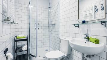 Shower, free toiletries, hair dryer, slippers