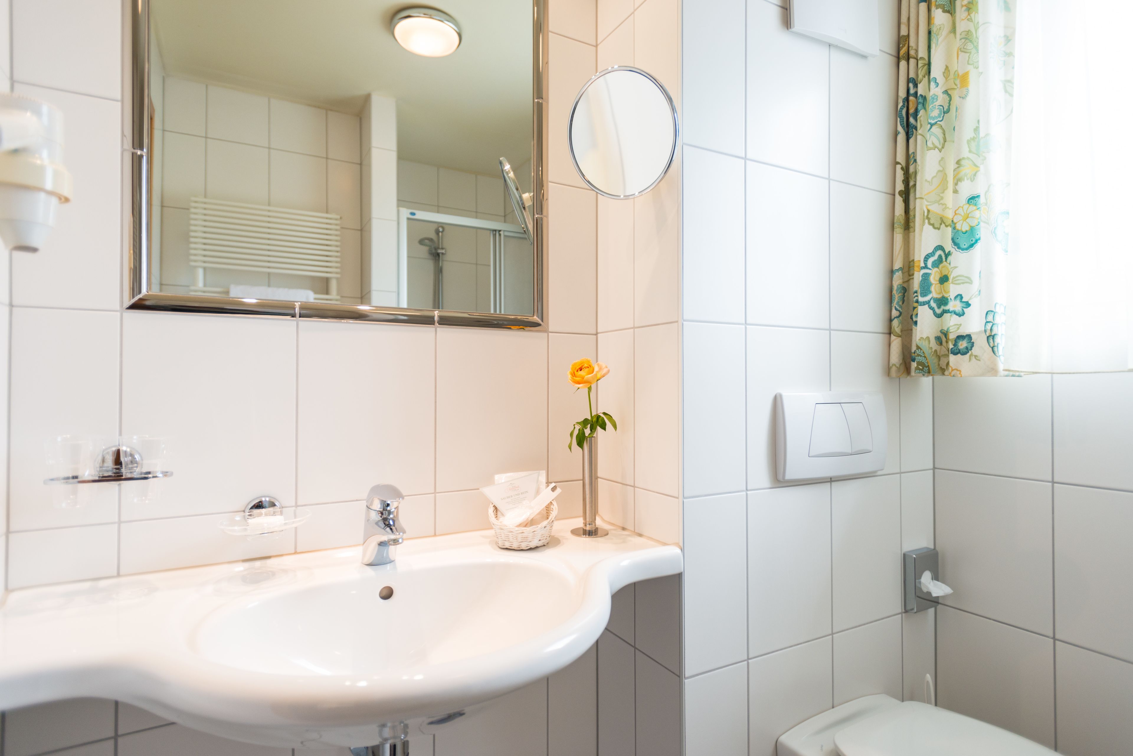standard double room | bathroom | deep-soaking bathtub, free toiletries, hair dryer, dressing gowns