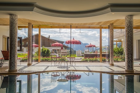 Indoor pool, open 7:00 AM to 7:00 PM, sun loungers