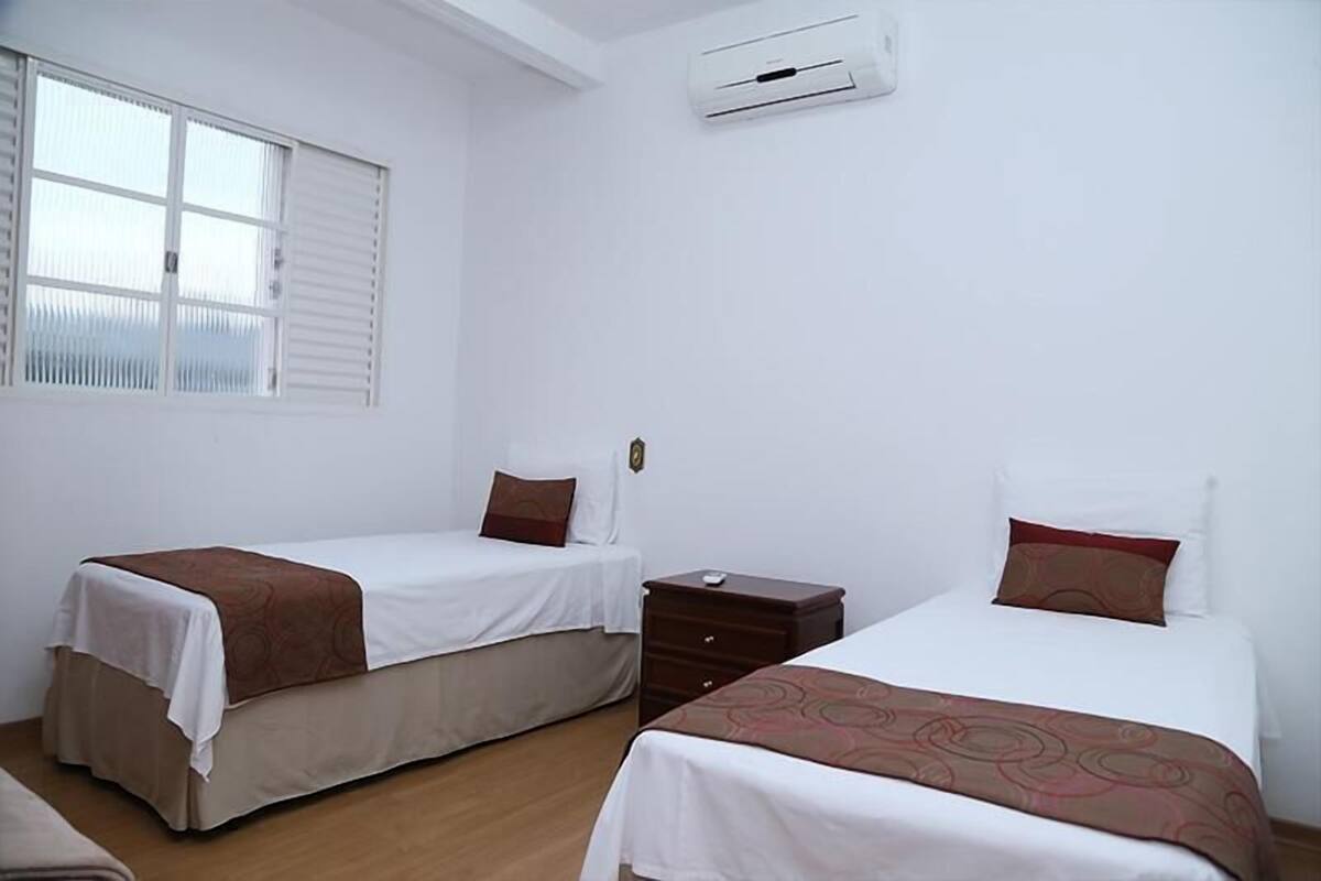 Deluxe Suite, 2 Twin Beds | Blackout drapes, WiFi (free), bed sheets
