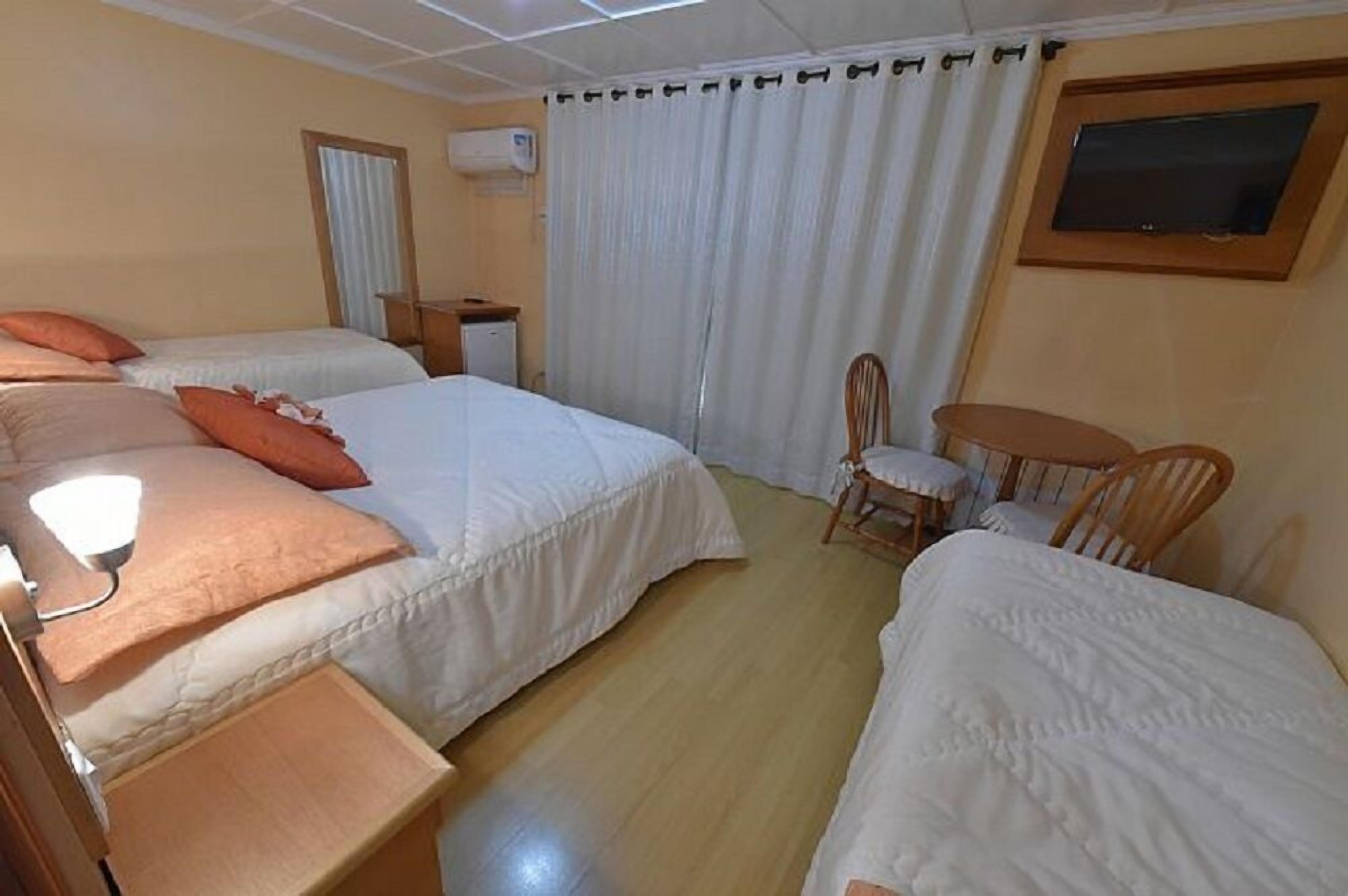 minibar, blackout curtains, iron/ironing board, free wifi