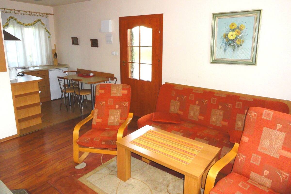 Bungalow, 2 Bedrooms (1) | Living area | Flat-screen TV, fireplace