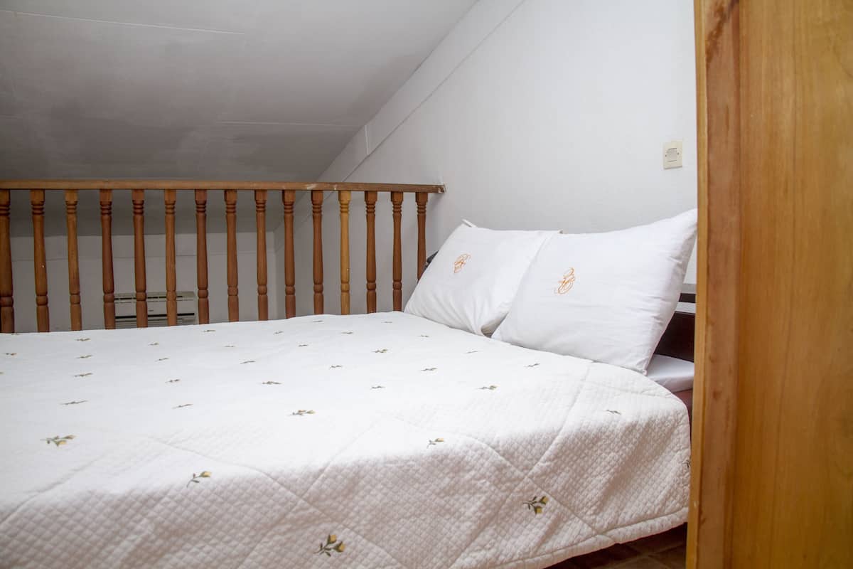 Duplex, 1 King Bed | Premium bedding, minibar, desk, blackout drapes