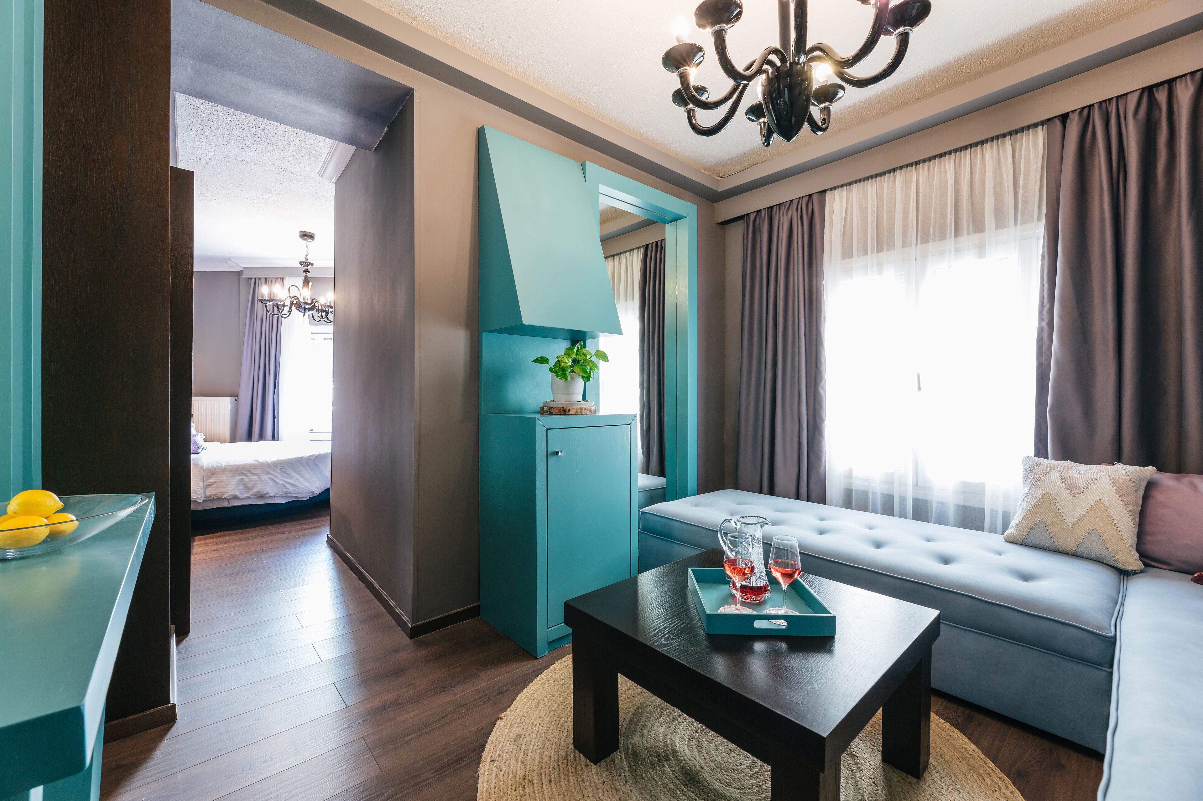 deluxe suite | living area | flat-screen tv