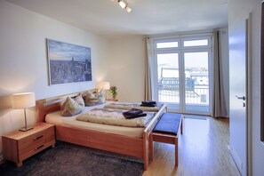 Deluxe-huoneisto, parveke | Ilmainen Wi-Fi