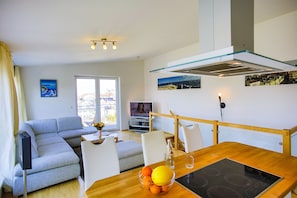Deluxe Apartment, Balcony | Living area