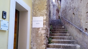 A narrow stone staircase leading up to a door labeled "LA GAETANA B&B". - B&B La Gaetana (Gaeta)